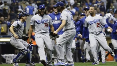 Los Angeles Dodgers head coach Dave Roberts celebrates a Dodgers win during  an MLB regular season game against the Arizona Diamondbacks, Saturday, Jul  Stock Photo - Alamy